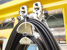 I-beam cable festoon system in use on a Pouring Crane